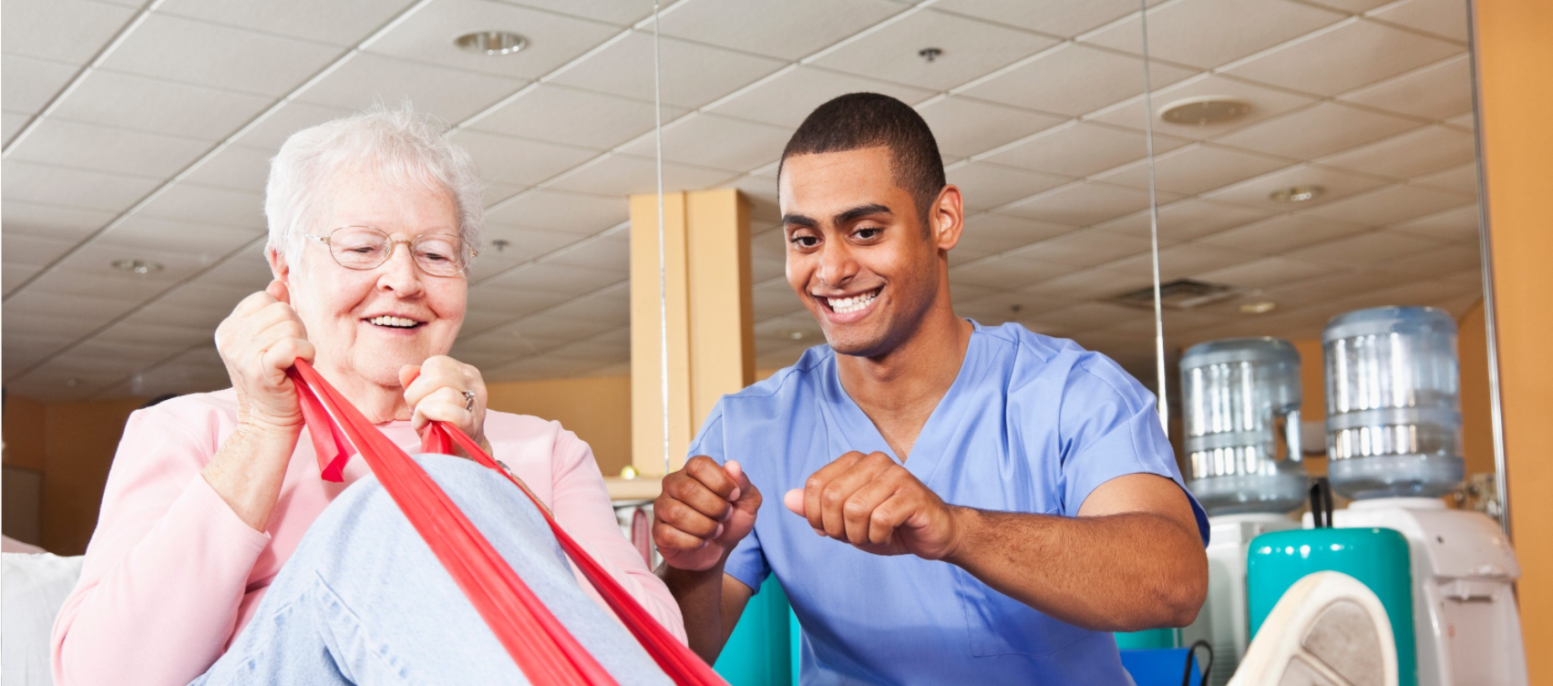 A nurse assisting a patient exercise